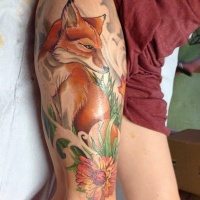 Vivid colors fox with flowers tattoo on thigh