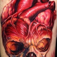 Vivid colors heart with skull tattoo by Paul Acker