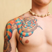 Vivid colors octopus tattoo on shoulder and chest