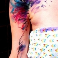 Vivid colors watercolor abstraction tattoo on shoulder
