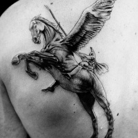 Warrior with a spear on a horse with wings tattoo on shoulder blade