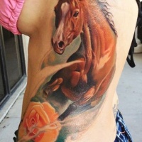 Watercolor  horse and rose tattoo on side