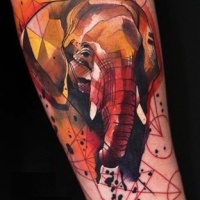 Watercolor elephant tattoo on forearm
