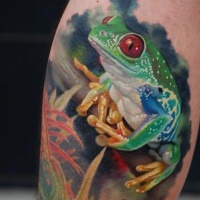 Watercolor green frog with red eyes tattoo
