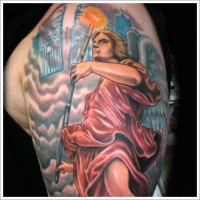 Watercolor saint michael tattoo on half sleeve