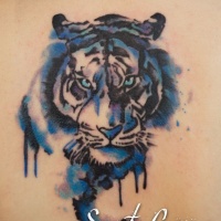 Watercolor style big blue colored upper back tattoo of tiger