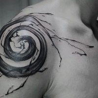 Watercolor style black ink shoulder tattoo of vortex