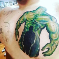 Watercolor style colored chest tattoo of Hulk and human silhouette