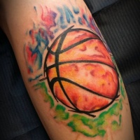 Watercolor style colored leg tattoo of burning basketball