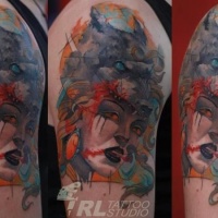 Watercolor style colored shoulder tattoo of mystic woman portrait and wolf skin