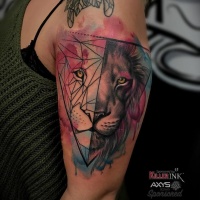 Watercolor style colored shoulder tattoo of steady lion head with triangles