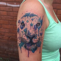 Watercolor style colored shoulder tattoo of tiger face