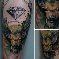 Watercolor style colored thigh tattoo of deer with big diamond