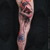 Watercolor style colored whole leg tattoo of cute woman with flowers