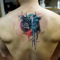 Watercolor style creative painted upper back tattoo of owl with moon shaped ornament