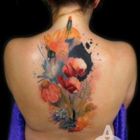 Watercolor style creepy looking back tattoo of beautiful flowers