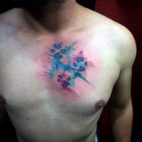 Watercolor style creepy looking chest tattoo of cat paw prints