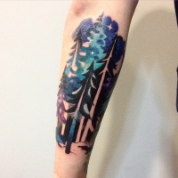 Watercolor style forearm tattoo of night forest