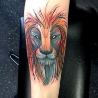 Watercolor style forearm tattoo of steady lion face