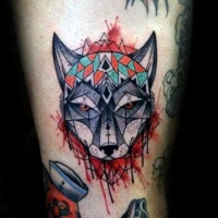 Watercolor style impressive looking thigh tattoo of fantasy wolf with ornaments