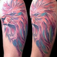 Watercolor style picture like shoulder tattoo of roaring lion