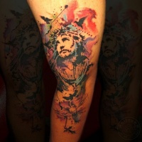 Watercolor style sleeve tattoo of Jesus with flowers