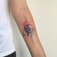 Watercolor style wonderful looking forearm tattoo of mystic triangle