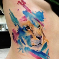 Watercolor lion tattoo on side