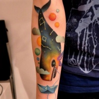 Watercolor whale tattoo on arm by Marcin Surowiek