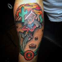 Western themed colored sleeping cowboy tattoo on arm