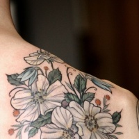 White bells flowers tattoo on shoulder