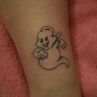 White ink cartoon ghost tattoo on skin