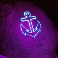 White ink luminescence simple design small steel anchor tattoo