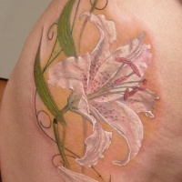 White lily flower tattoo on ribs