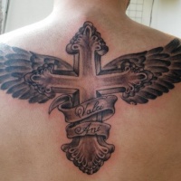 Winged cross memorial tattoo on back