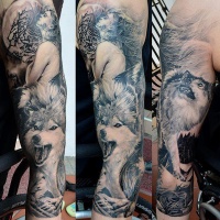 Wolf and girl tattoo on the shoulder is view