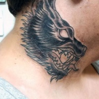 Wolf tattoo on the neck