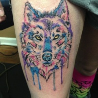 Wolf watercolor tattoo on thigh leg for woman