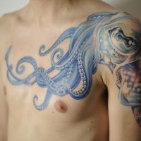 Wonderful blue octopus tattoo on shoulder and chest