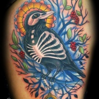 Wonderful colored big beautiful crow with blooming tree tattoo