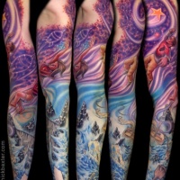 Wonderful colored massive fantasy world tattoo on sleeve
