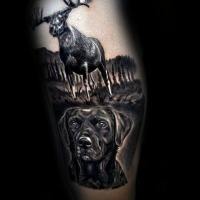 Wonderful looking black and white dog portrait tattoo on arm with big elk