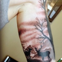 Wonderful looking realistic black and gray style biceps tattoo of deers in wild life
