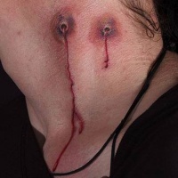 Wonderful very detailed 3D like colored bloody vampire bite tattoo on neck