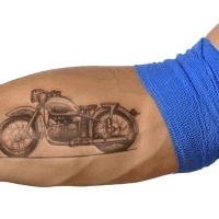 Wonderful vintage motorcycle forearm tattoo