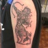 3D like accurate painted colored Sagittarius tattoo on upper arm
