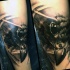 3D like black and white realistic eagle head tattoo on forearm