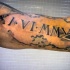 3D spectacular looking black and white biceps tattoo of memorial date and star