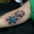 3D style amazing looking biceps tattoo of puzzle pieces and dragon skin