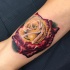 3D style amazing looking colorful rose tattoo on arm
